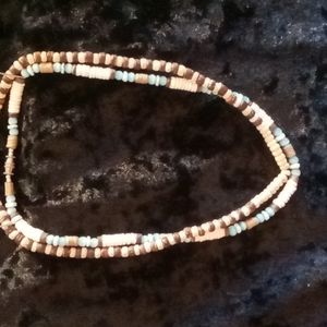 2 necklaces Shells blue cats eye quartz and wooden beads. 16 inch long